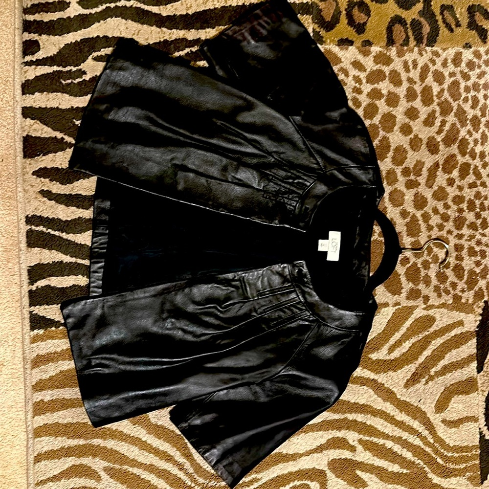 Ann Taylor Loft genuine black, short sleeve leather jacket.